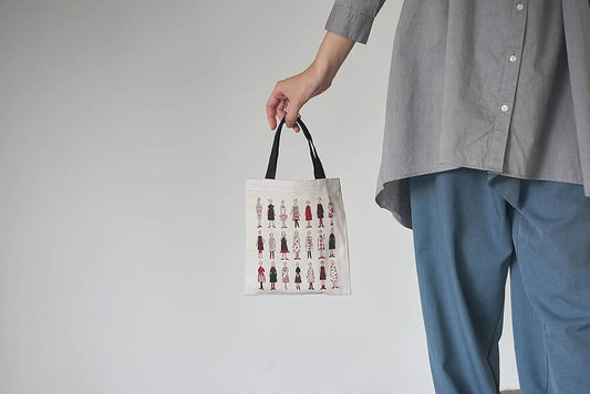 Fabric "100 women" by Cosmo to make a bag