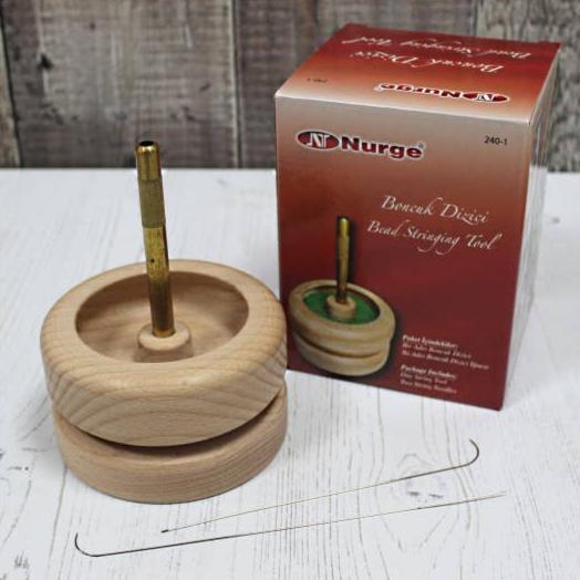 Herramienta para encordar cuentas de madera de haya Nurge