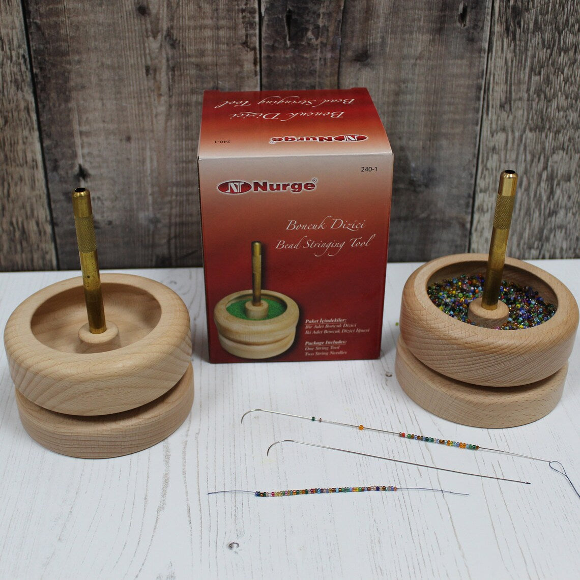 Herramienta para encordar cuentas de madera de haya Nurge